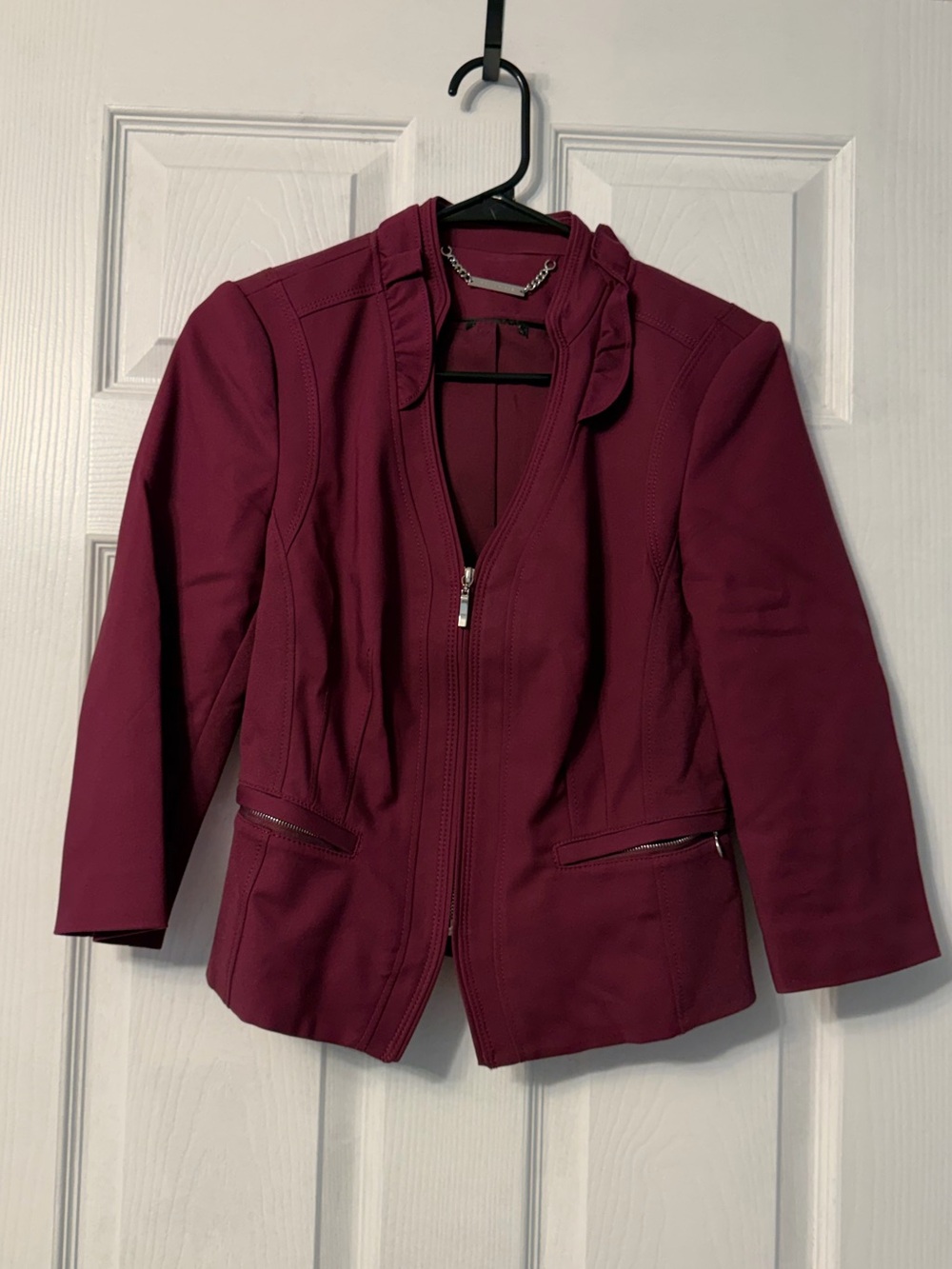White House Black Market blazer features a chic structured stand collar and tail